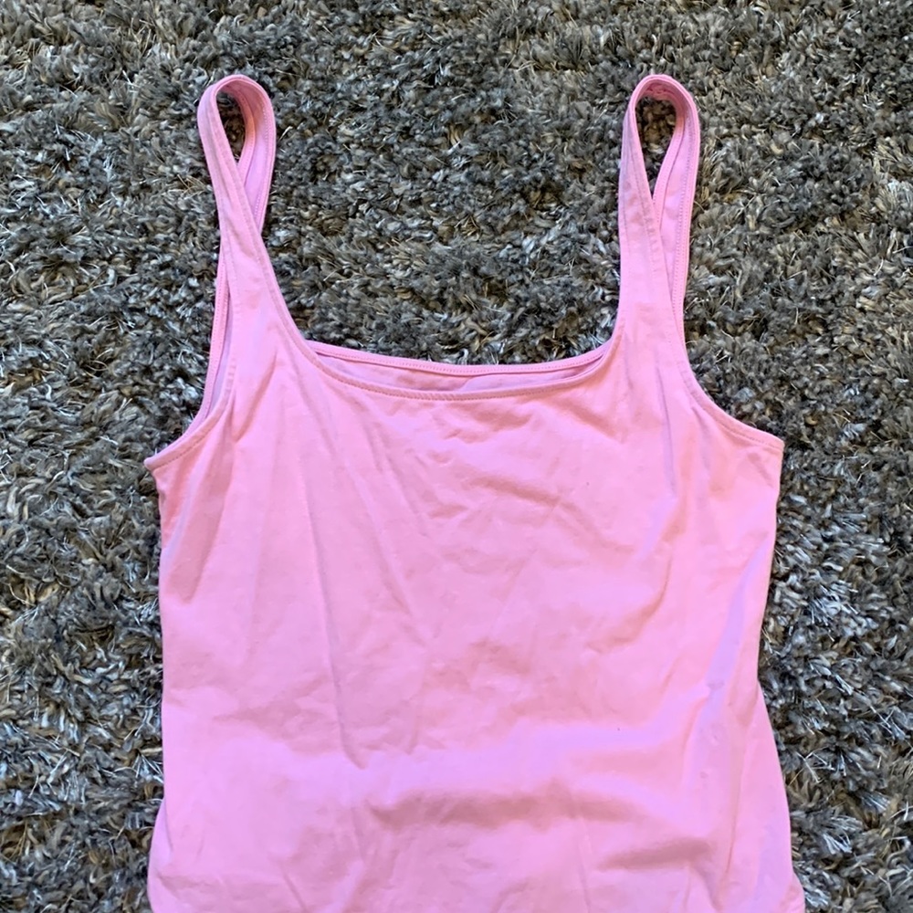 pink body suit
